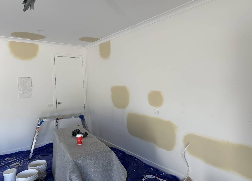 Plaster patch repairs across a wall before painting — 4P Collective, Melbourne